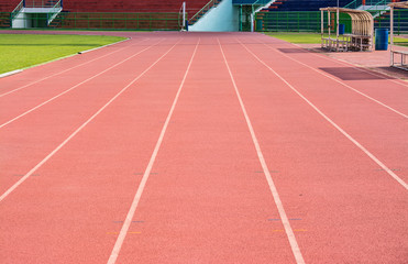 Fototapeta premium A stadium is a place for outdoor sports consists of a field or stage either partly or completely surrounded by a tiered structure designed to allow spectators to stand or sit and view the event.