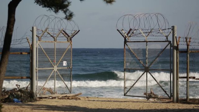 Border fence on the shore of the Sea of Japan in South Korea