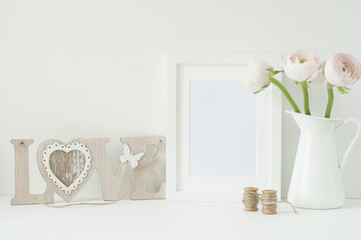 White frame mockup with pink ranunculos