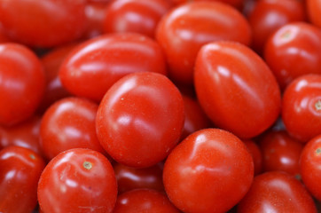 Ripe fresh red tomatoes on a market
