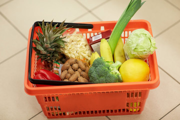 food basket on grocery or supermarket floor