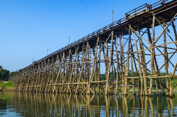 long wooden bridge in Sangklaburi, Thailand, vintage filter image