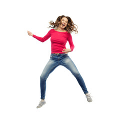 happy woman jumping and pretending guitar playing