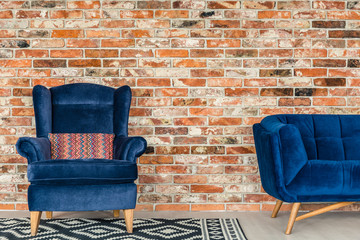 Blue upholstered armchair