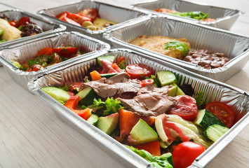 Healthy food in boxes, diet concept.