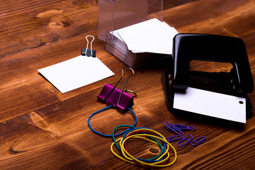 stationery for office: clips, blanks, rubber band, hole puncher
