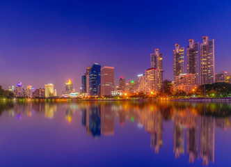 Fototapeta na wymiar Cityscape image of Benchakitti Park at twilight time in Bangkok, Thailand.