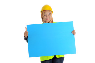 Construction worker wear yellow safety helmet show thumbs up and smile while holding text space card.