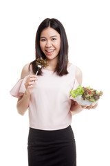 Healthy Asian business woman with salad.