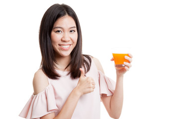 Young Asian woman thumbs up drink orange juice.