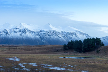Fototapeta na wymiar Snowy Mountain view in Hofn - Iceland