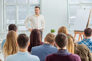 Speaker at Business Meeting in the conference hall.