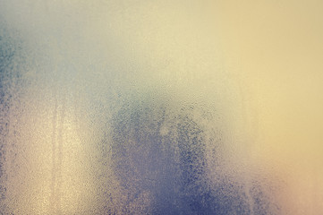 Abstract condensation foggy cold window background