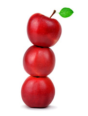 Red apples with green leaf isolated on white background.