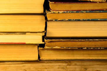Fototapeta premium Pile of the books on wooden table