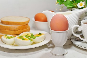 Easter- traditional Easter breakfast - Festive Easter table in white - soft focus, selective focus