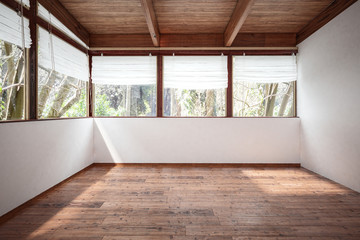 Empty room with panoramic windows