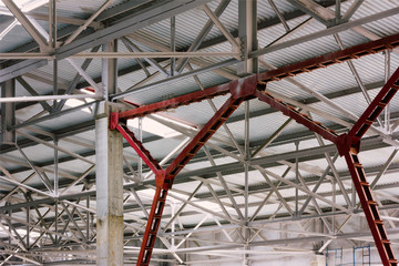 The metal frame of the production facilities of the roof