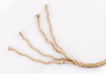 close up of unraveled rope on white
