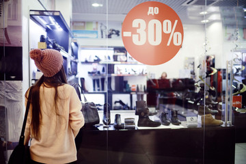 young girl's winter sale shopping center