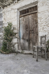 broken wooden chair at street