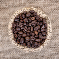 Coffee beans in burlap. Top view.