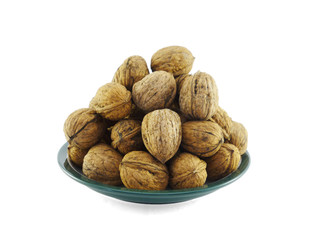 nuts on plate on white