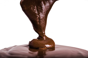 Melted hot chocolate is pouring