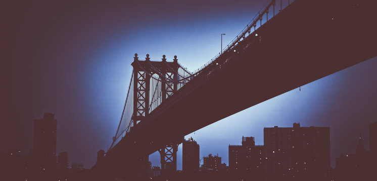 Blue glowing Manhattan bridge duotone concept © XtravaganT