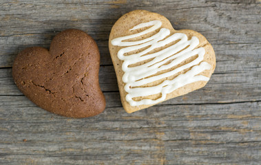 Valentine cookies with heart shape on wooden background, greeting card 