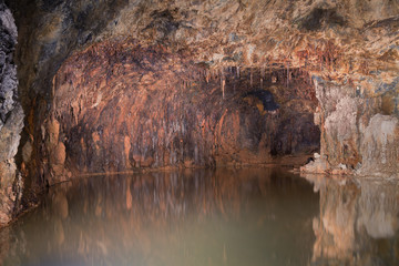 underground lake in shades of red