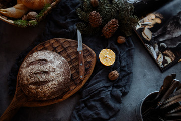 loaf of bread and knife on a table