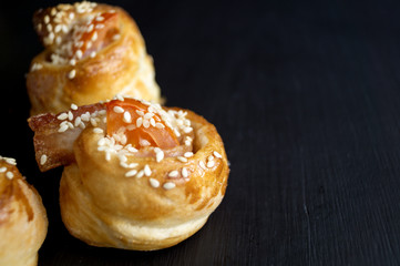 homemade rolls from the dough with bacon and tomato
