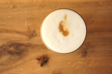 Fototapeta na wymiar Coffee latte foam in a glass