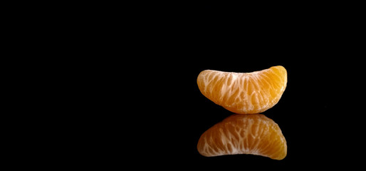 tangerine on black background