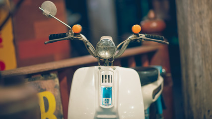 Retro white motorcycle in a vintage style.
