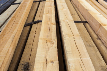 Stack of wooden terrace planks at the lumber yard.