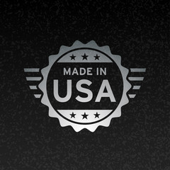 Made in USA icon concept badge design with metallic silver American flag emblem on black grunge background. Vector illustration.