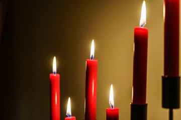 red candles on a chandelier
