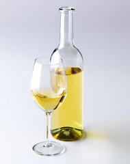 Bottle and glass of white wine