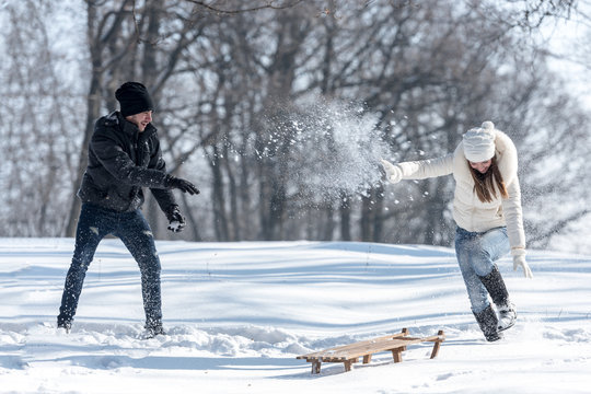 Couple Snow Fighting