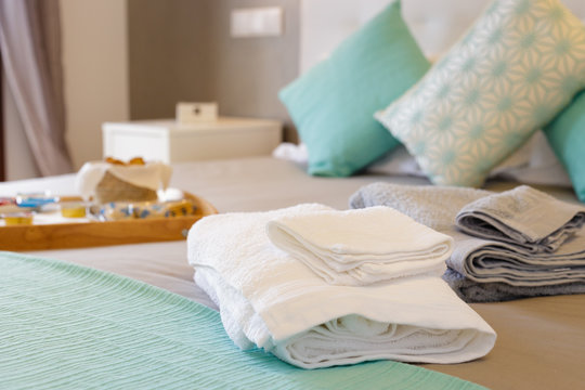 Bed with fresh towels
