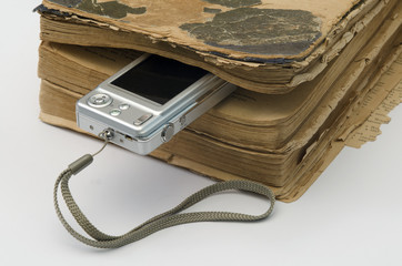 old book and a digital camera