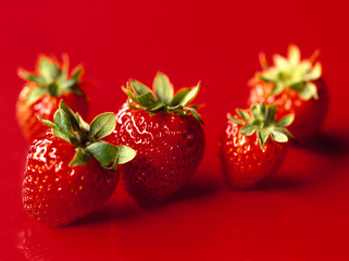 Strawberry on red background