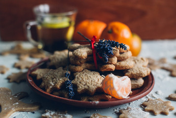 Christmas or new year gingerbread cookies on a plate