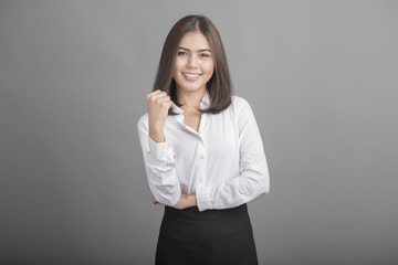 Beautiful Business Woman confident on grey background
