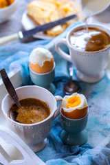 Chicken boiled eggs on stands and coffee