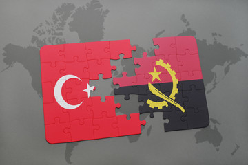 puzzle with the national flag of turkey and angola on a world map