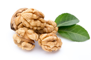 Walnut and walnut kernel isolated on the white background.