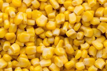 Bulk of yellow corn grains texture.